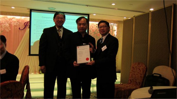 President Mr. Michael Fan and Vice President Mr. Ocean Chan presented Fellowship Certificate to Mr. Lawrence Tze